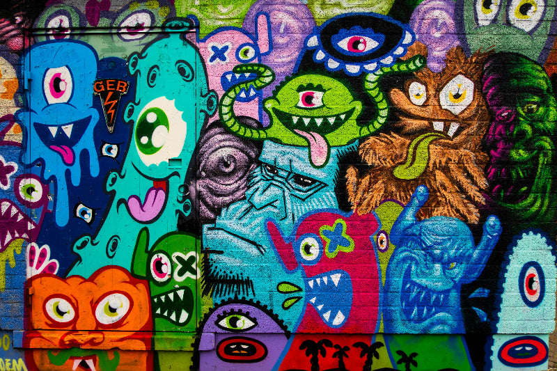 Foto einer besprühten Wand an der Berliner Mauer. 