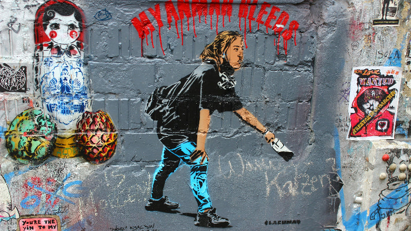 Foto von einem politischen Graffiti auf einer Hauswand in Berlin. 
